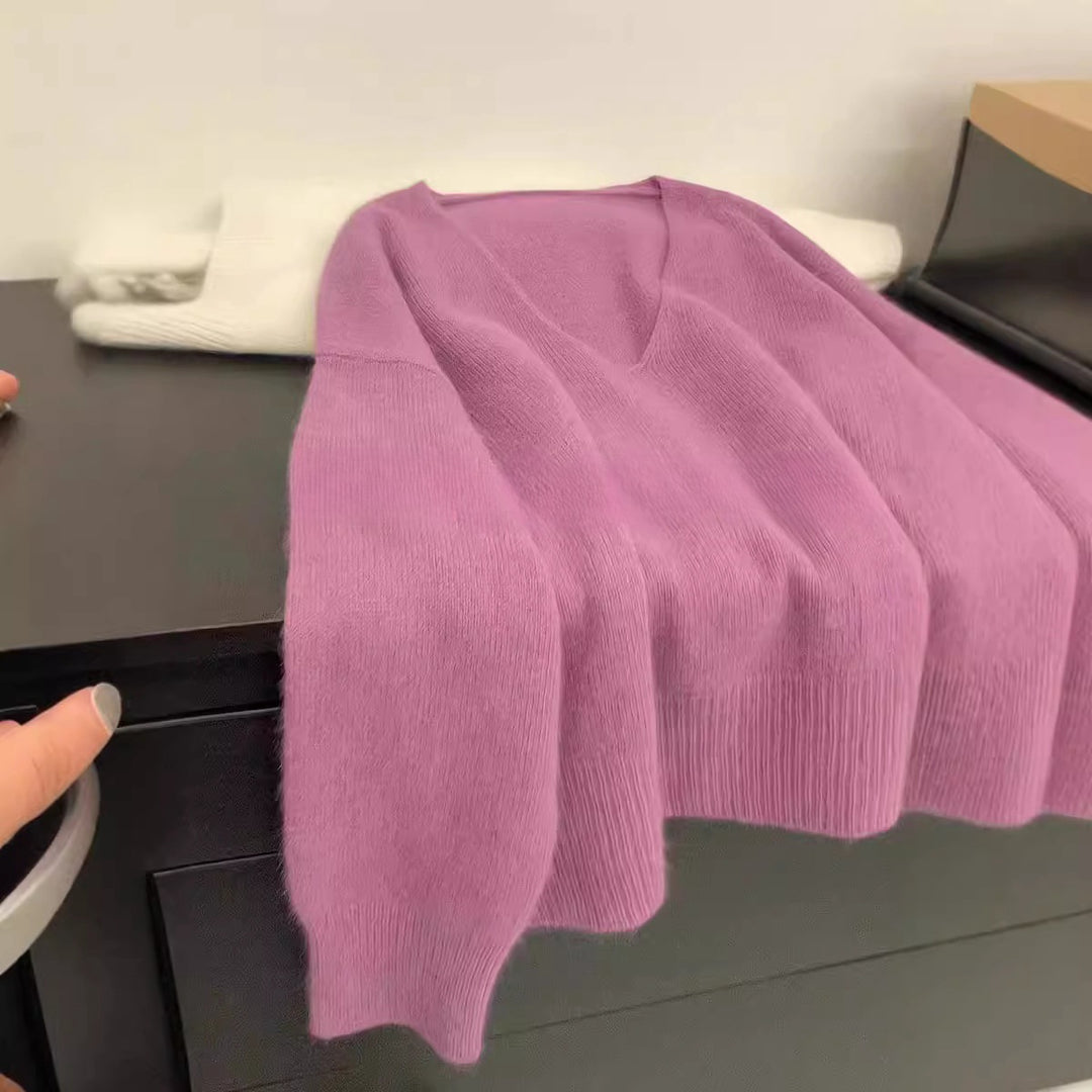 Kvinnor Elegant V-Hals Tröja med Ribbad Struktur och Avslappnad Snitt Mirla-Eva Jonsson