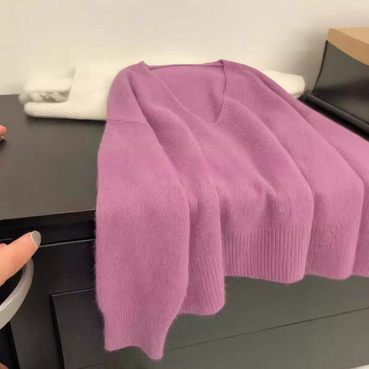 Kvinnor Elegant V-Hals Tröja med Ribbad Struktur och Avslappnad Snitt Mirla-Eva Jonsson