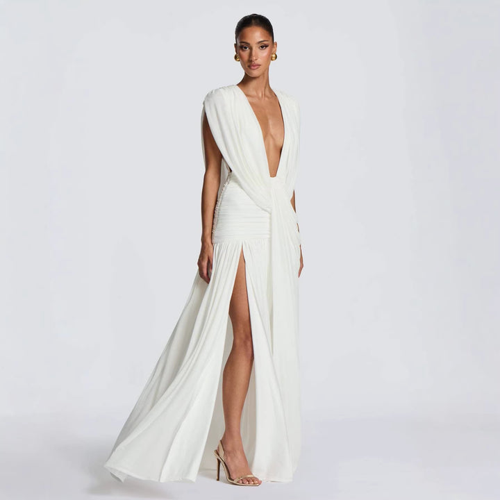Kvinnor Elegant Wrap Klänning med Djup V-Hals och Rynkad Kjol Mirla-Eva Jonsson
