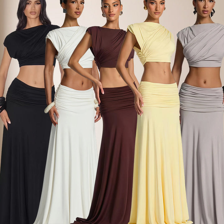 Kvinnor Elegant Wrap Klänning med Draperad Topp och Flödande Kjol Mirla-Eva Jonsson