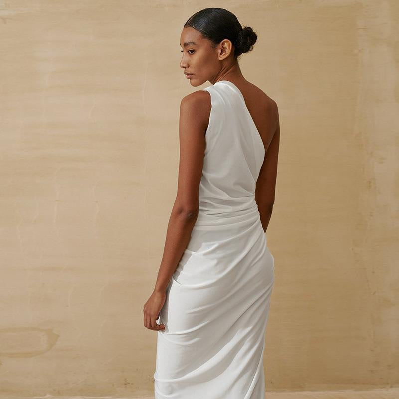Kvinnor Elegant Wrapklänning med skimrande satin och hög slits Mirla-Eva Jonsson