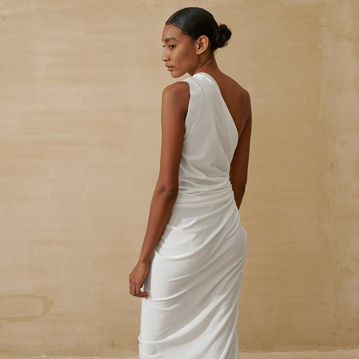 Kvinnor Elegant Wrapklänning med skimrande satin och hög slits Mirla-Eva Jonsson
