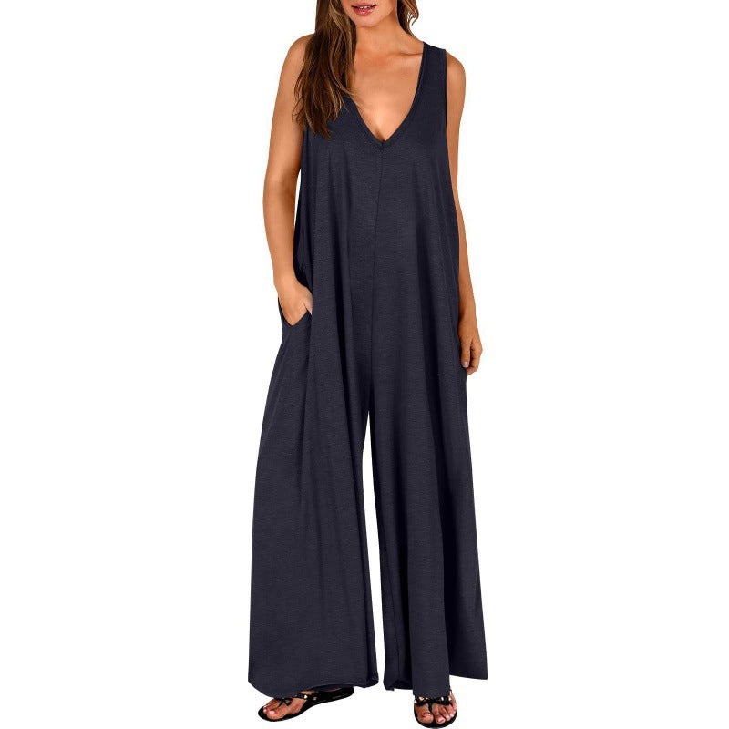 Kvinnor Elegant, vid jumpsuit med djup V-ringning och praktiska fickor Mirla-Eva Jonsson