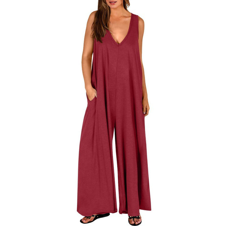 Kvinnor Elegant, vid jumpsuit med djup V-ringning och praktiska fickor Mirla-Eva Jonsson