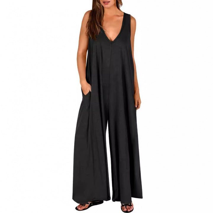 Kvinnor Elegant, vid jumpsuit med djup V-ringning och praktiska fickor Mirla-Eva Jonsson