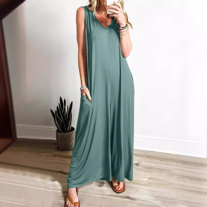 Kvinnor Elegant, vid jumpsuit med djup V-ringning och praktiska fickor Mirla-Eva Jonsson