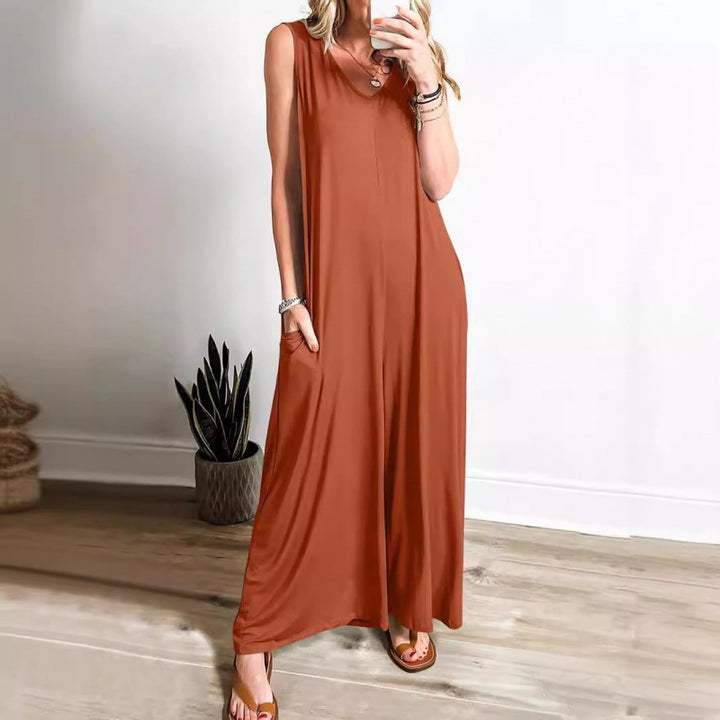 Kvinnor Elegant, vid jumpsuit med djup V-ringning och praktiska fickor Mirla-Eva Jonsson