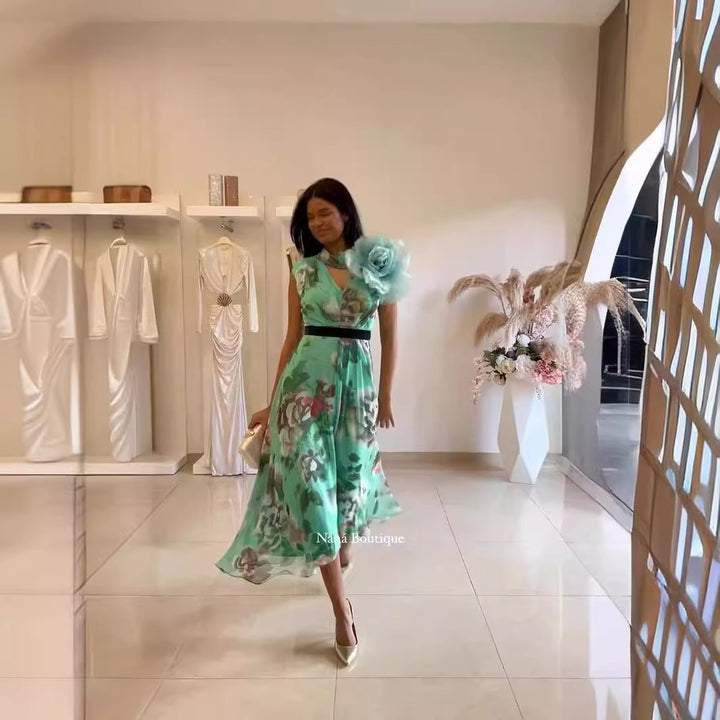 Kvinnor Fladdrande Maxi Klänning med Blommönster och Off-Shoulder Volang Mirla-Eva Jonsson
