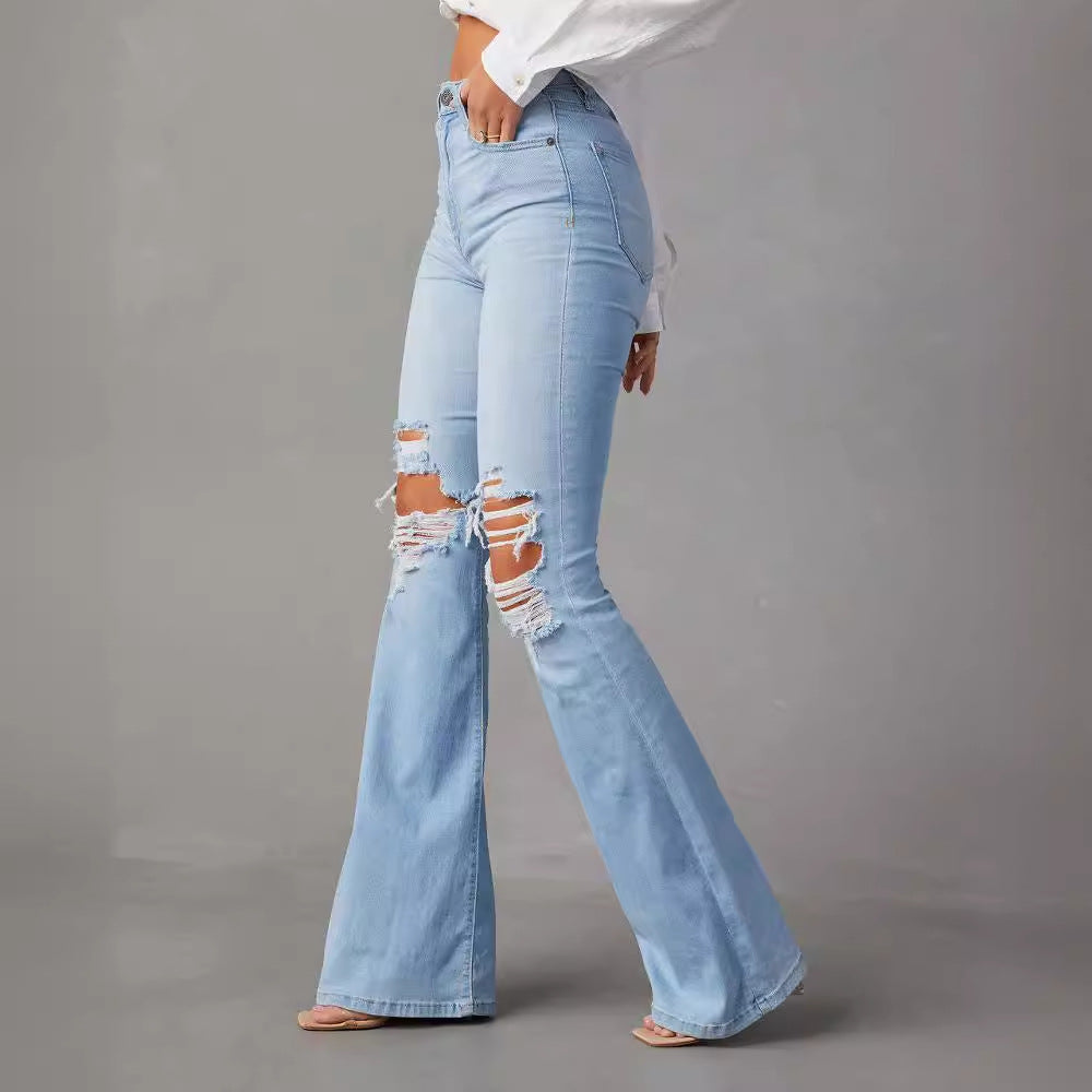 Kvinnor Flared Jeans med trendiga förstörda detaljer och hög midja Mirla-Eva Jonsson