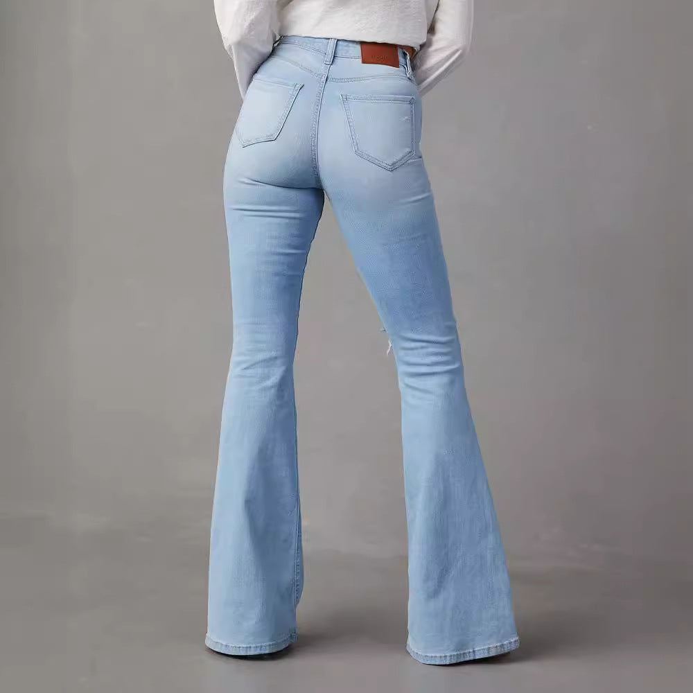 Kvinnor Flared Jeans med trendiga förstörda detaljer och hög midja Mirla-Eva Jonsson