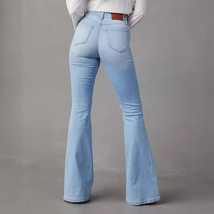 Kvinnor Flared Jeans med trendiga förstörda detaljer och hög midja Mirla-Eva Jonsson