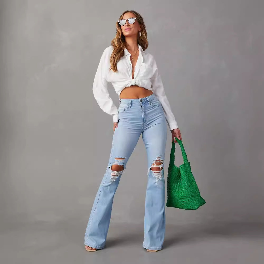 Kvinnor Flared Jeans med trendiga förstörda detaljer och hög midja Mirla-Eva Jonsson
