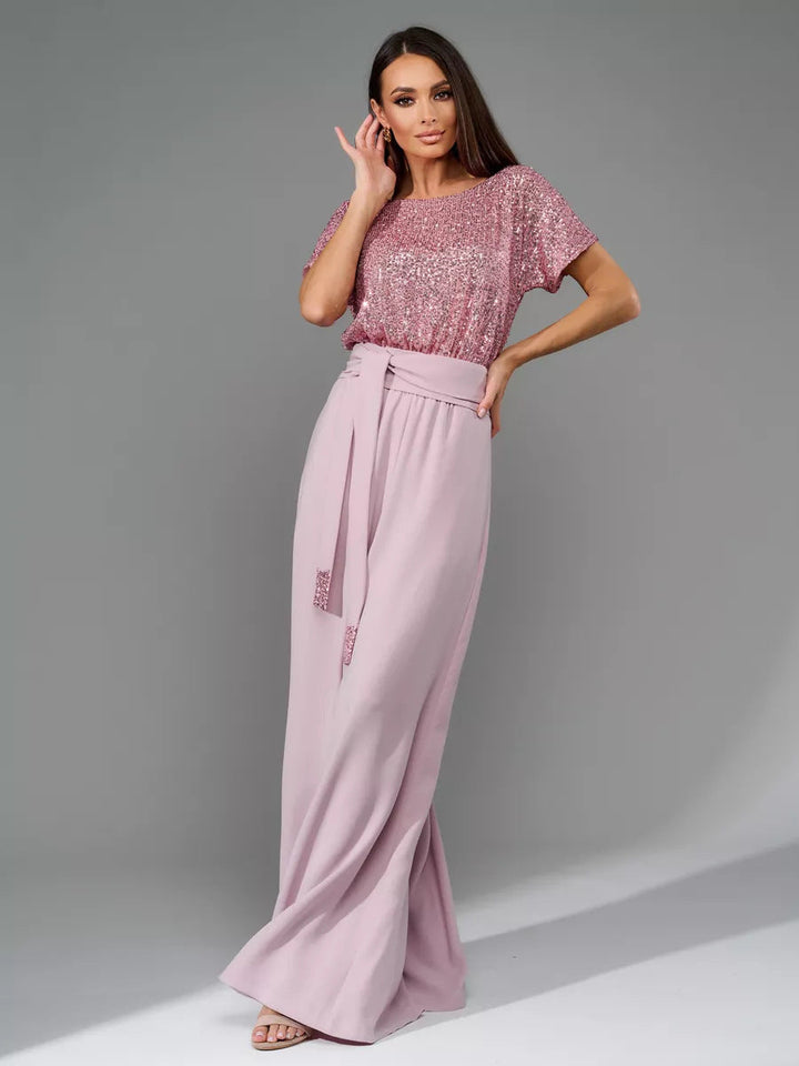 Kvinnor Glamourös Stil-Outfit med Glittrande Ovan och Bred Snitt Mirla-Eva Jonsson