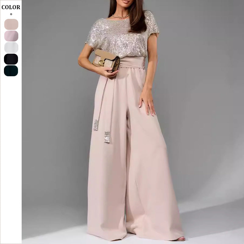 Kvinnor Glamourös Stil-Outfit med Glittrande Ovan och Bred Snitt Mirla-Eva Jonsson