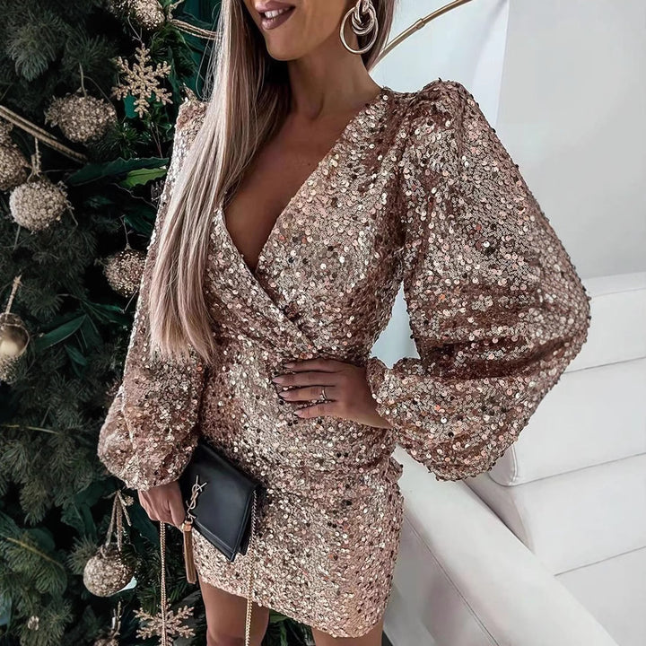 Kvinnor Glittrande Miniklänning med Ballongsärmar och Inlindad Utseende-Eva Jonsson