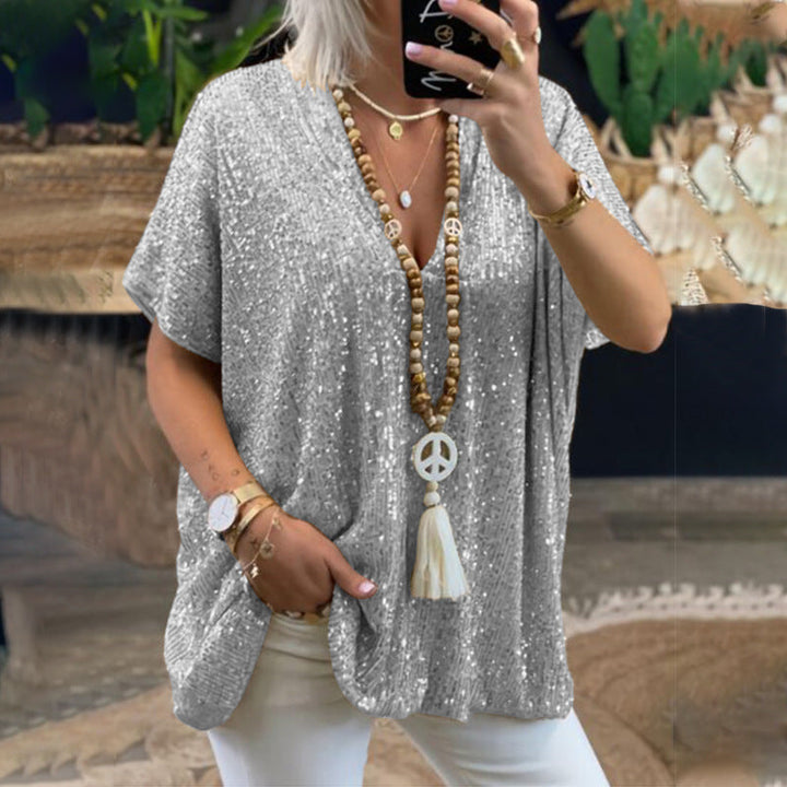 Kvinnor Glittrigt Topp med Elegant V-Hals och Lätt Snitt Mirla-Eva Jonsson