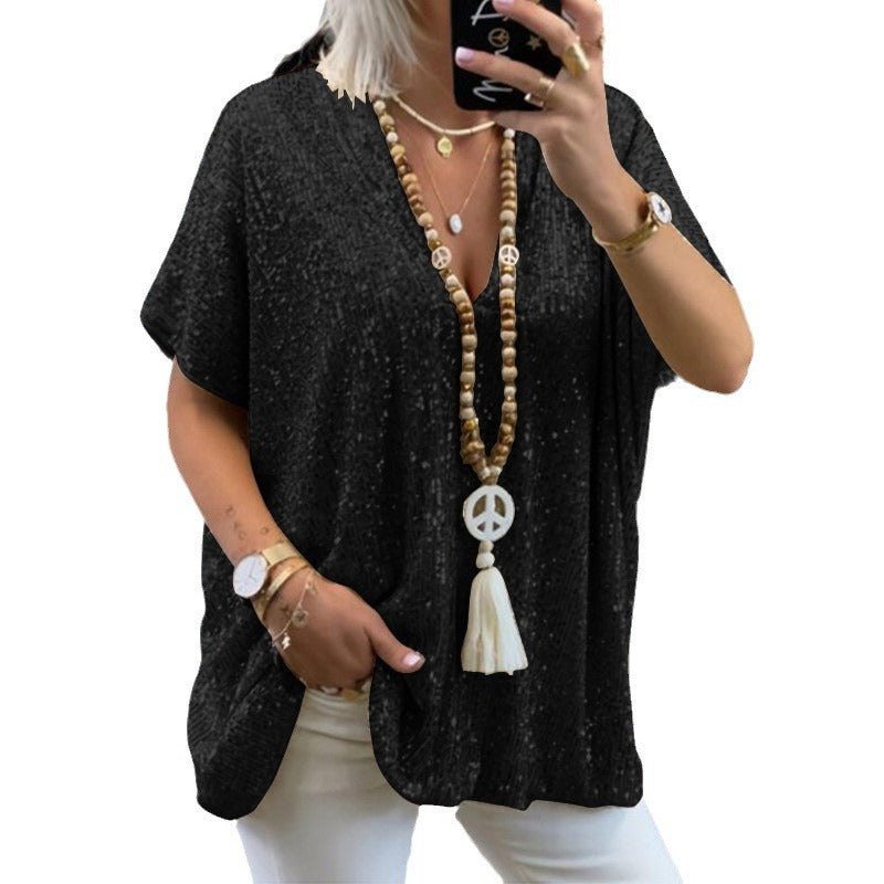 Kvinnor Glittrigt Topp med Elegant V-Hals och Lätt Snitt Mirla-Eva Jonsson