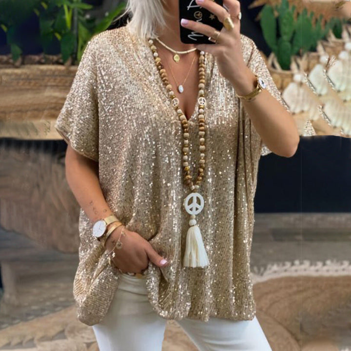Kvinnor Glittrigt Topp med Elegant V-Hals och Lätt Snitt Mirla-Eva Jonsson