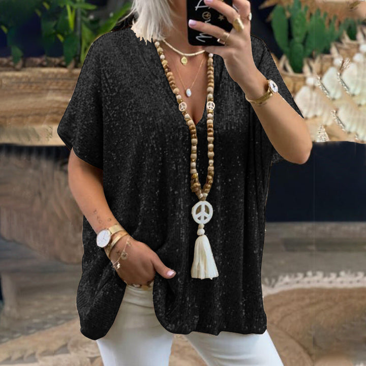 Kvinnor Glittrigt Topp med Elegant V-Hals och Lätt Snitt Mirla-Eva Jonsson