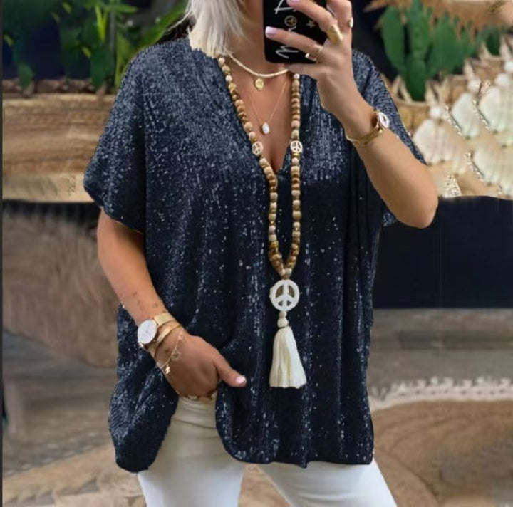 Kvinnor Glittrigt Topp med Elegant V-Hals och Lätt Snitt Mirla-Eva Jonsson