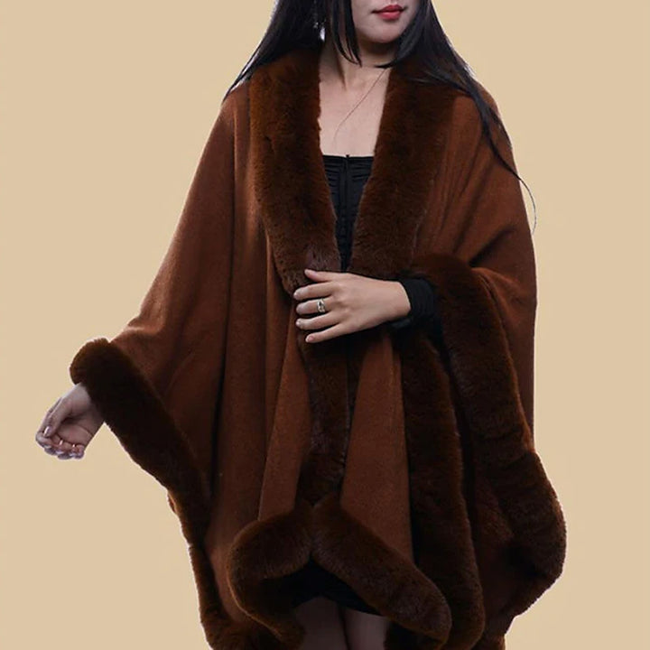 Kvinnor Konstpäls-Kappa med voluminös huva och elegant pälslook Mirla-Eva Jonsson