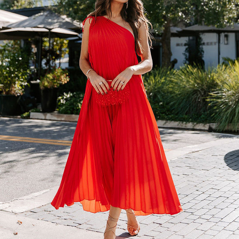 Kvinnor Maxiklänning med asymmetrisk skärning och plisséveck Mirla-Eva Jonsson