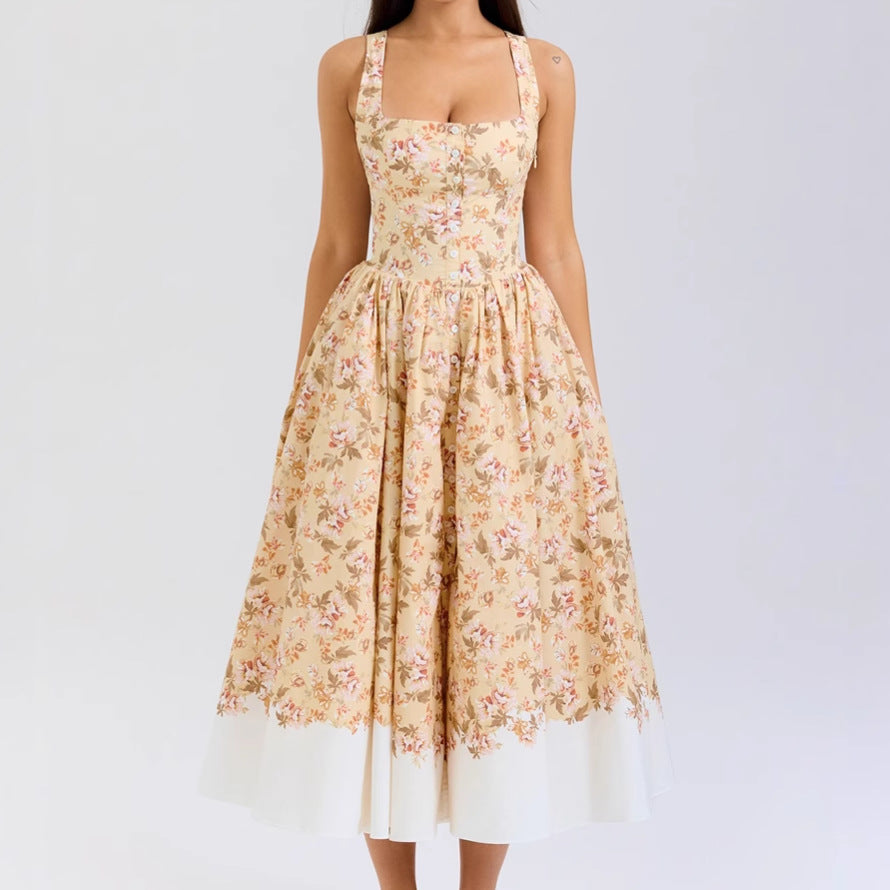 Kvinnor Midi Klänning med Elegant Blommönster och Smygremmar Mirla-Eva Jonsson