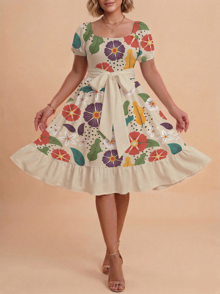 Kvinnor Midi Klänning med elegant blommönster och figursyddt bälte Mirla-Eva Jonsson