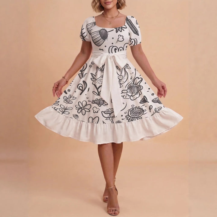 Kvinnor Midi Klänning med elegant blommönster och figursyddt bälte Mirla-Eva Jonsson