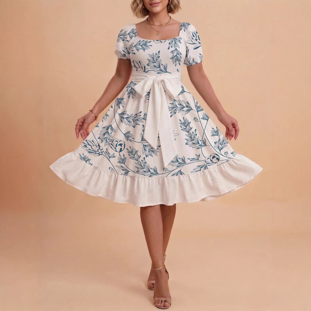 Kvinnor Midi Klänning med elegant blommönster och figursyddt bälte Mirla-Eva Jonsson