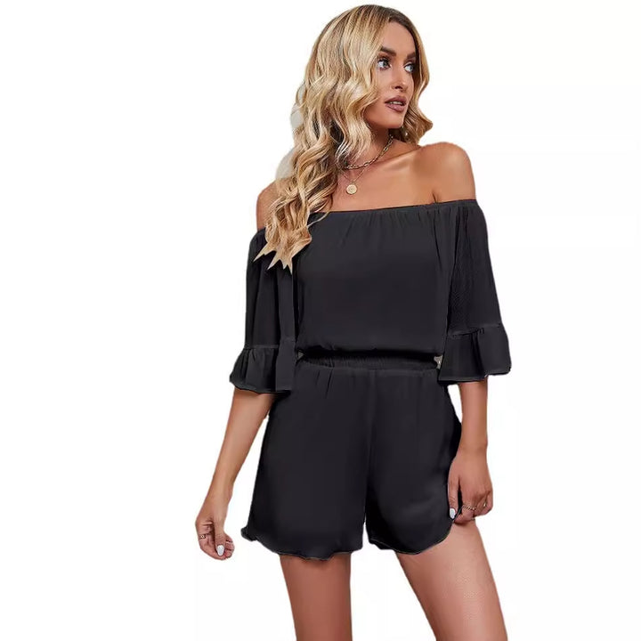 Kvinnor Off-Shoulder Jumpsuit med Voluminösa Ärmar och Elastisk Midja Mirla-Eva Jonsson