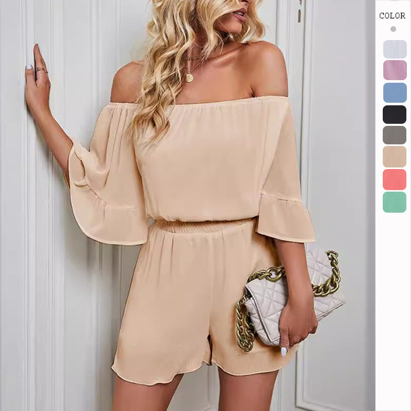 Kvinnor Off-Shoulder Jumpsuit med Voluminösa Ärmar och Elastisk Midja Mirla-Eva Jonsson