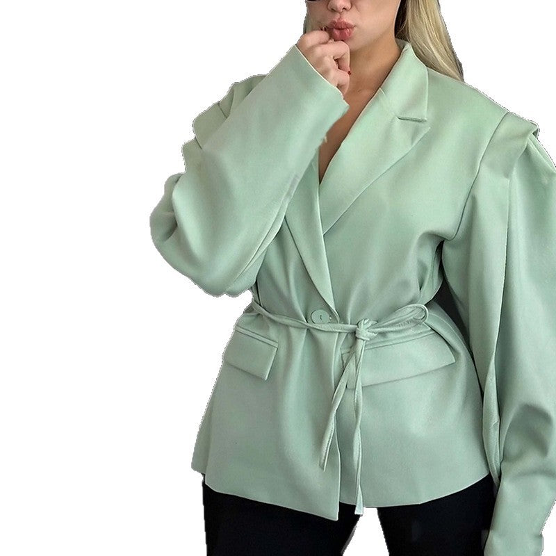 Kvinnor Oversized Blazer med midjebälte och eleganta puffärmar Mirla-Eva Jonsson