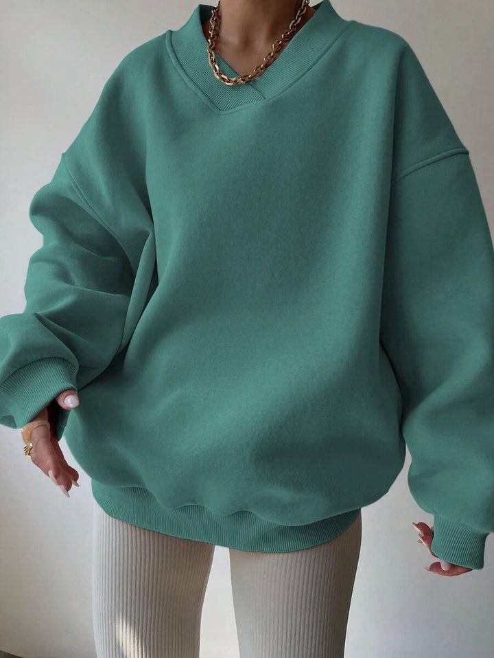 Kvinnor Oversized Sweatshirt med V-Hals Mirla-Eva Jonsson