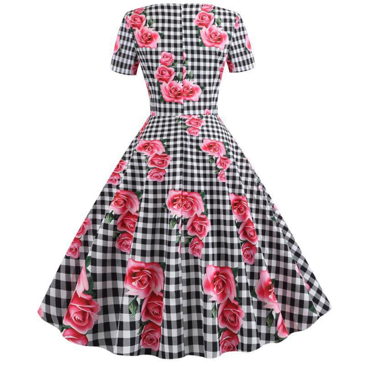 Kvinnor Rockabilly Klänning med Blommigt Rutmönster Mirla-Eva Jonsson