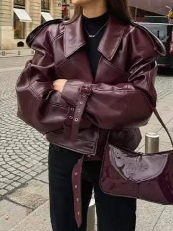 Kvinnor Trendig Oversized Lädernjacka med strukturerade axelbud och midjebälte Mirla-Eva Jonsson