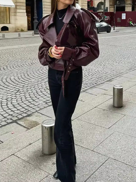 Kvinnor Trendig Oversized Lädernjacka med strukturerade axelbud och midjebälte Mirla-Eva Jonsson