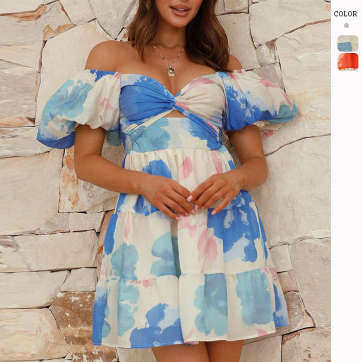 Kvinnor Voluminös Volang Klänning med Off-Shoulder Design och Blomster Mönster Mirla-Eva Jonsson
