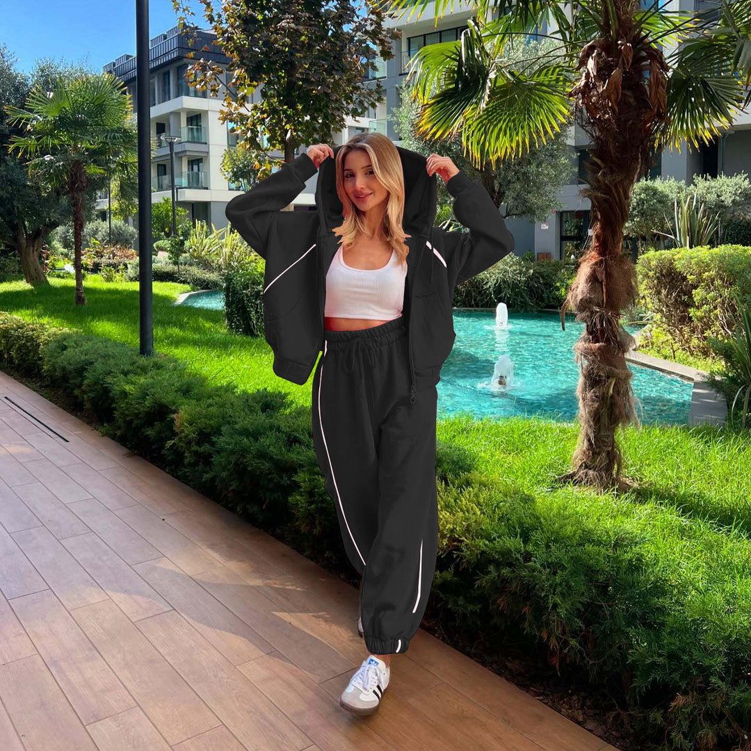 Kvinnor avslappnad fleece huvtröja och bekväm joggers set Mirla-Eva Jonsson
