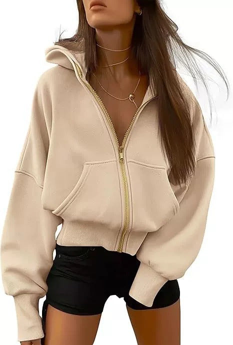Kvinnor avslappnad hoodie med voluminösa ärmar och guldfärgad dragkedja Eva Jonsson-Eva Jonsson