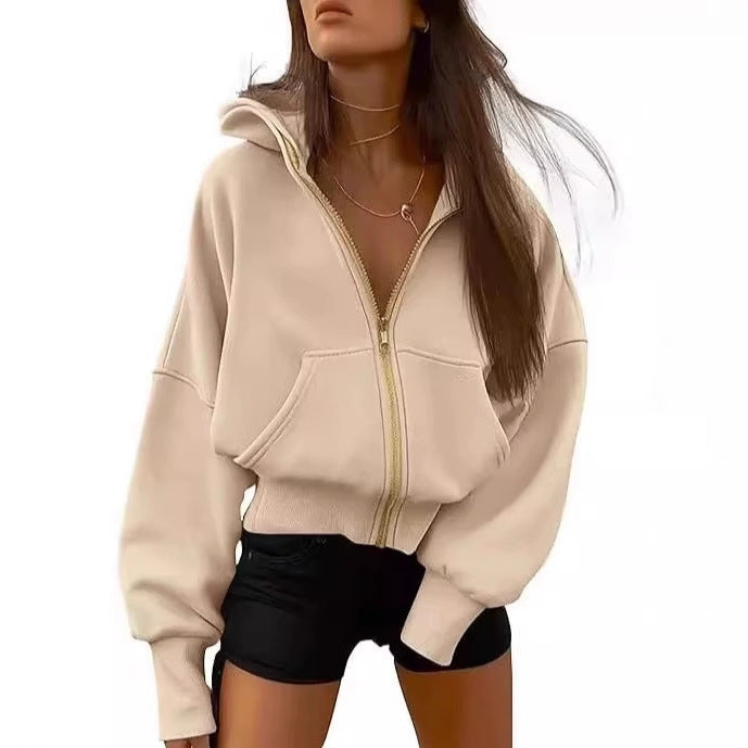 Kvinnor avslappnad hoodie med voluminösa ärmar och guldfärgad dragkedja Eva Jonsson-Eva Jonsson