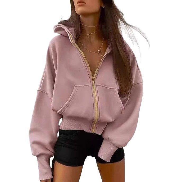 Kvinnor avslappnad hoodie med voluminösa ärmar och guldfärgad dragkedja Eva Jonsson-Eva Jonsson