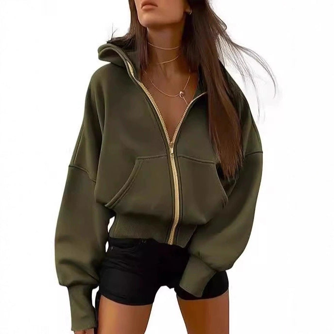 Kvinnor avslappnad hoodie med voluminösa ärmar och guldfärgad dragkedja Eva Jonsson-Eva Jonsson