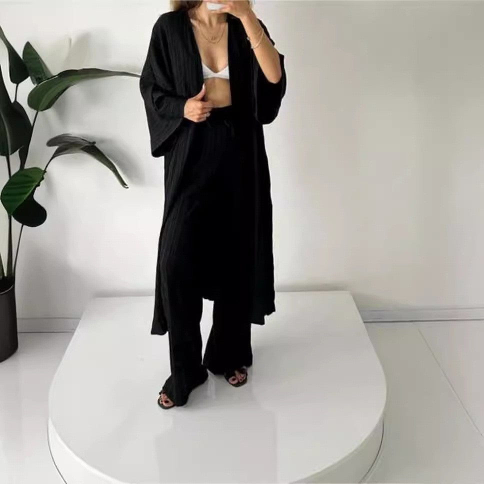Kvinnor avslappnad kimono-kappa med vid passform och eleganta plissé-detaljer Mirla-Eva Jonsson