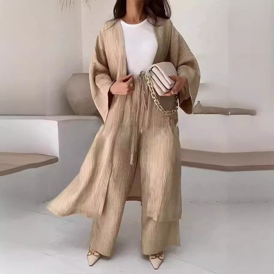 Kvinnor avslappnad kimono-kappa med vid passform och eleganta plissé-detaljer Mirla-Eva Jonsson