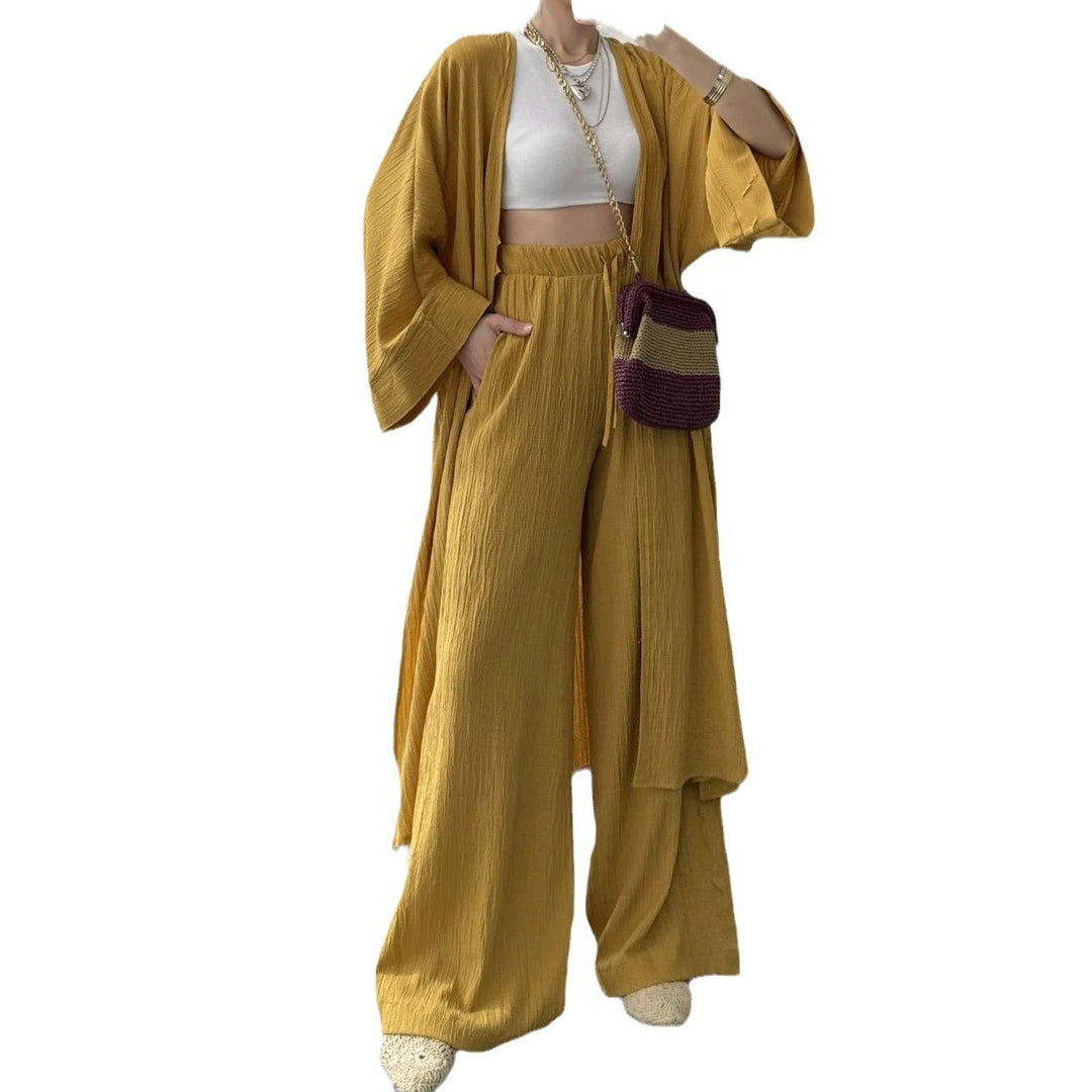 Kvinnor avslappnad kimono-kappa med vid passform och eleganta plissé-detaljer Mirla-Eva Jonsson