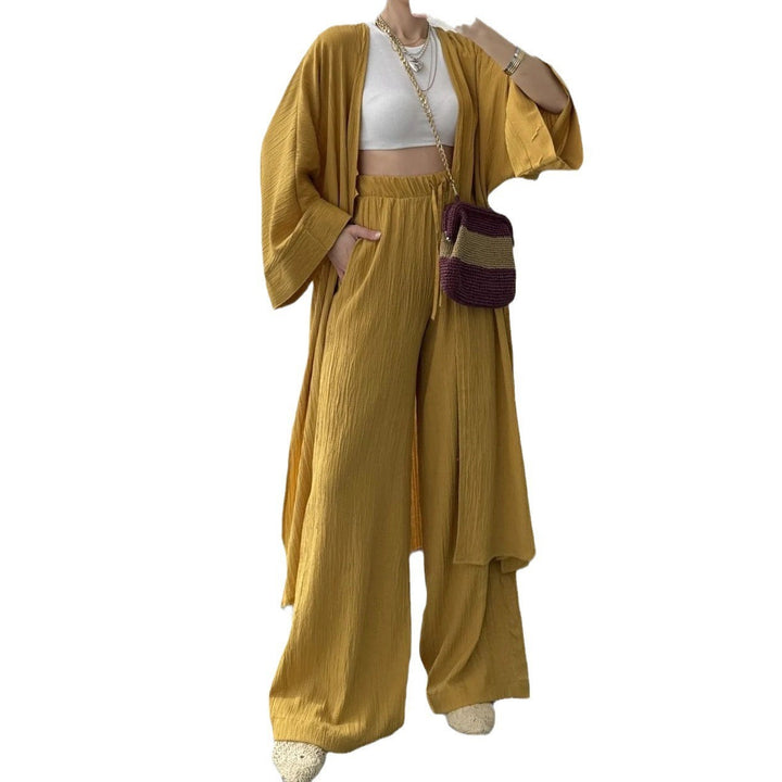 Kvinnor avslappnad kimono-kappa med vid passform och eleganta plissé-detaljer Mirla-Eva Jonsson