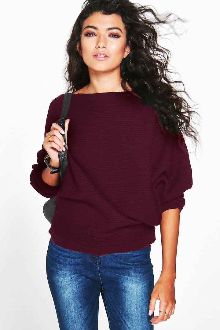 Kvinnor avslappnad stickad tröja med innovativ oversized skärning och trendiga puffärmar Mirla-Eva Jonsson