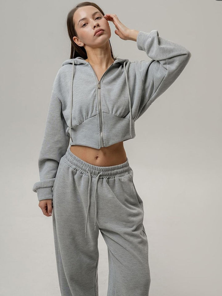 Kvinnor avslappnad sweatshirt och joggingbyxor set med hög krage och lös passform Mirla-Eva Jonsson