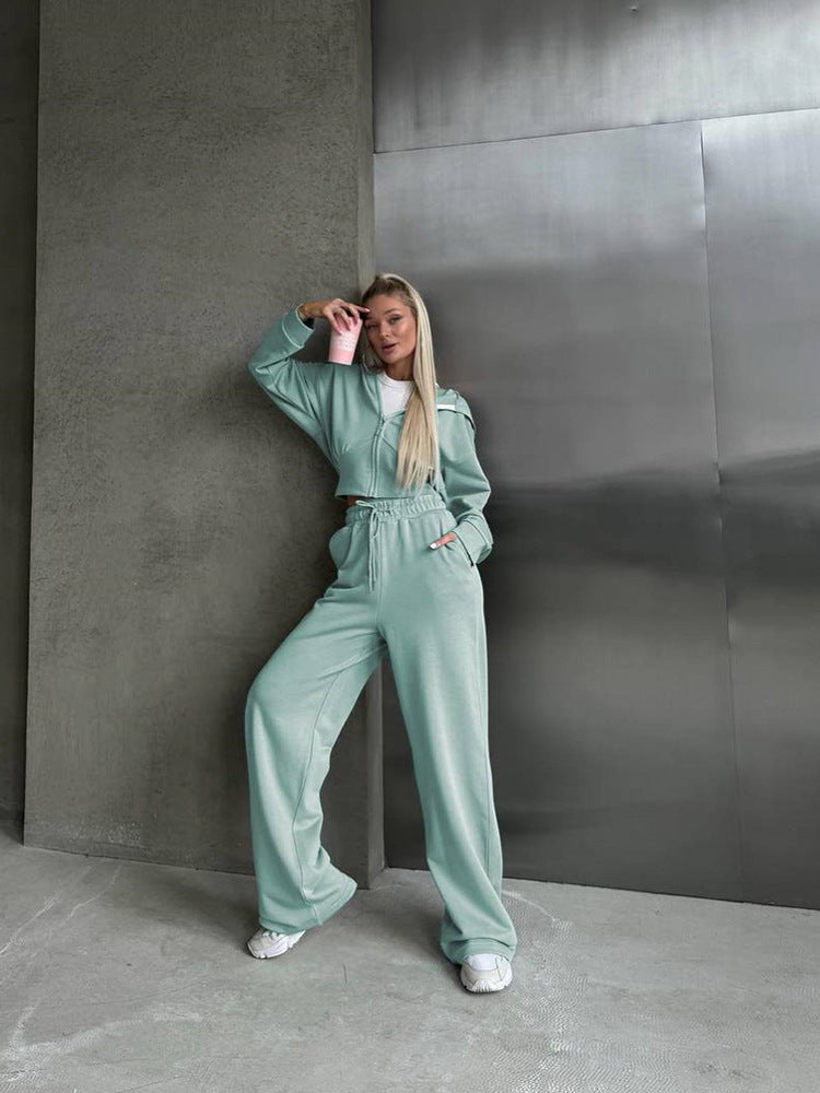 Kvinnor avslappnad sweatshirt och joggingbyxor set med hög krage och lös passform Mirla-Eva Jonsson